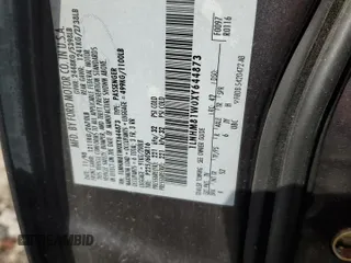 1999 Lincoln Town Car Executive z VIN 1LNHM81W0XY644873, wystawiony jako Copart lot #52865095 z przebiegiem Nie podano mil oraz Szkoda całkowita • Salvage title. Historia ofert i sprzedaży dostępna na DreamBid. Obrazek 12.