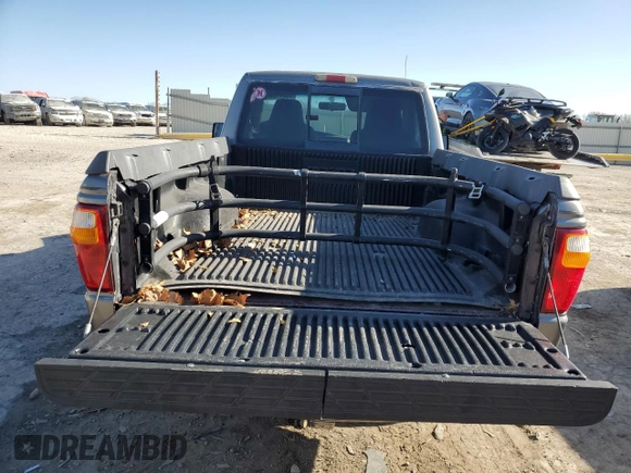 1999 Mazda B-Series Truck SX z VIN 4F4YR12C5XTM24067, wystawiony jako Copart lot #85241964 z przebiegiem 219 030 mil mil oraz Szkoda całkowita • Salvage title. Historia ofert i sprzedaży dostępna na DreamBid. Obrazek 10.