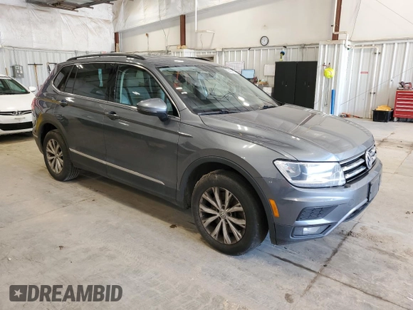 2018 Volkswagen Tiguan SEL с VIN 3VV2B7AX2JM027014, выставлен на аукционе Copart как лот 62408815 с пробегом 131 053 миль миль и Чистый • Clean title. История ставок и продаж доступна на DreamBid. Изображение 4.