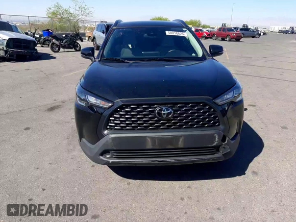 2022 Toyota Corolla Cross LE with VIN 7MUCAABG1NV033299, listed as a Copart auction lot 58018825 with 28,138 mi miles and Salvage title. Bid and sale history available at DreamBid. Image 11.