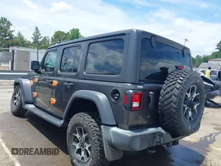 2019 Jeep Wrangler Unlimited Sport S with VIN 1C4HJXDN4KW577273, listed as a IAAI auction lot 42435847 with 69,403 mi miles and . Bid and sale history available at DreamBid. Image 14.