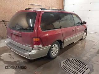 2003 Ford Windstar LTD with VIN 2FMDA58433BB41744, listed as a IAAI auction lot 41385411 with 186,368 mi miles and . Bid and sale history available at carsss.com. Image 4.