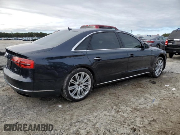 2015 Audi A8 L 4.0T with VIN WAU32AFD1FN000783, listed as a Copart auction lot 89306805 with 115,241 mi miles and Salvage Title. Bid and sale history available at carsss.com. Image 3.