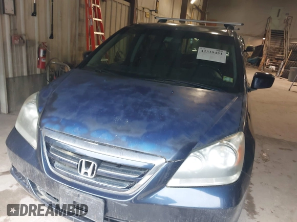 2007 Honda Odyssey EX-L z VIN 5FNRL386X7B014590, wystawiony jako IAAI lot #42339451 z przebiegiem 216 247 mil mil oraz . Historia ofert i sprzedaży dostępna na DreamBid. Obrazek 6.