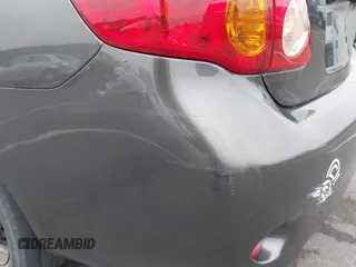 2009 Toyota Corolla z VIN JTDBL40E99J047697, wystawiony jako IAAI lot #42274336 z przebiegiem 184 756 mil mil oraz . Historia ofert i sprzedaży dostępna na DreamBid. Obrazek 13.