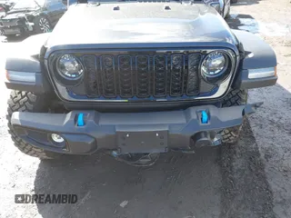 2024 Jeep Wrangler Willys z VIN 1C4RJXN61RW322456, wystawiony jako IAAI lot #41747226 z przebiegiem 2 043 mil mil oraz . Historia ofert i sprzedaży dostępna na DreamBid. Obrazek 12.