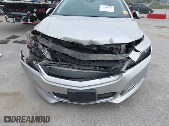 2014 Chevrolet Impala LT with VIN 2G1125S39E9313542, listed as a IAAI auction lot 41988420 with 227,093 mi miles and . Bid and sale history available at DreamBid. Image 6.