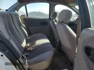 1996 Saturn SL with VIN 1G8ZK5279TZ162812, listed as a Copart auction lot 87079874 with 143,461 mi miles and Salvage title. Bid and sale history available at DreamBid. Image 10.