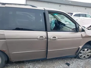 2004 Honda Odyssey EX z VIN 5FNRL18634B004127, wystawiony jako IAAI lot #41854878 z przebiegiem 242 601 mil mil oraz . Historia ofert i sprzedaży dostępna na DreamBid. Obrazek 13.