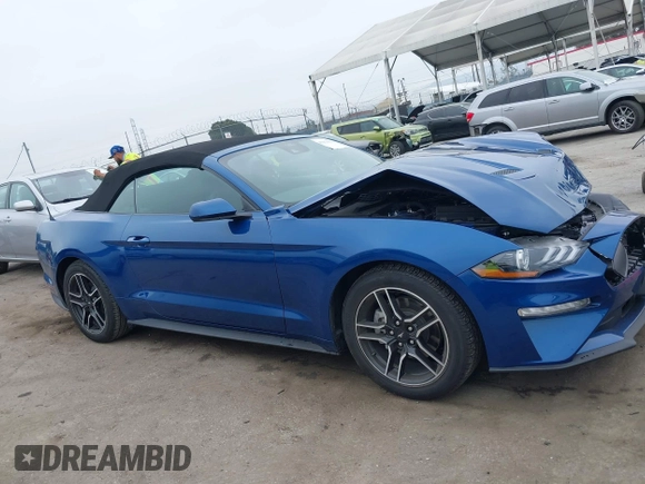 2022 Ford Mustang EcoBoost z VIN 1FATP8UH7N5144894, wystawiony jako IAAI lot #42173373 z przebiegiem 12 066 mil mil oraz . Historia ofert i sprzedaży dostępna na DreamBid. Obrazek 13.