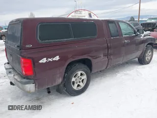 2005 Dodge Dakota SLT with VIN 1D7HW42N65S305733, listed as a IAAI auction lot 41289814 with 149,226 mi miles and . Bid and sale history available at DreamBid. Image 4.