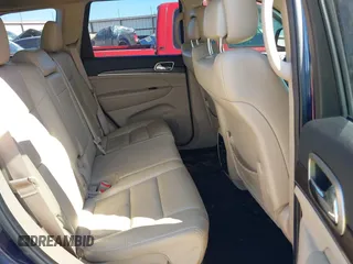 2017 Jeep Grand Cherokee Limited with VIN 1C4RJEBG9HC677036, listed as a IAAI auction lot 42187687 with 127,802 mi miles and . Bid and sale history available at DreamBid. Image 8.