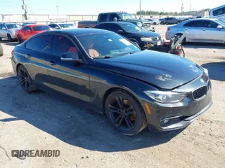 2019 BMW 4 Series 430i with VIN WBA4J1C56KBM13881, listed as a IAAI auction lot 41657332 with 125,147 mi miles. Bid and sale history available at carsss.com. Image 1.