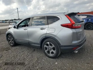 2017 Honda CR-V EX with VIN 7FARW1H58HE011809, listed as a Copart auction lot 48028085 with 63,510 mi miles and Salvage Title. Bid and sale history available at carsss.com. Image 2.