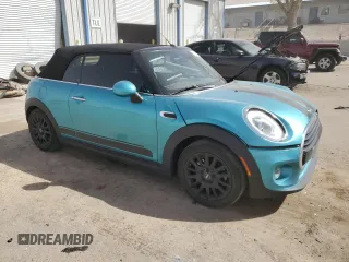 2018 MINI Convertible Cooper with VIN WMWWG5C5XJ3D00672, listed as a Copart auction lot 45905045 with 73,554 mi miles and Salvage Title. Bid and sale history available at DreamBid. Image 4.