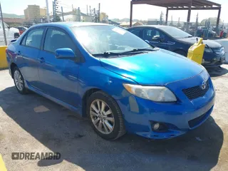 2009 Toyota Corolla with VIN 1NXBU40E49Z022648, listed as a IAAI auction lot 42042633 with 134,628 mi miles. Bid and sale history available at carsss.com. Image 1.