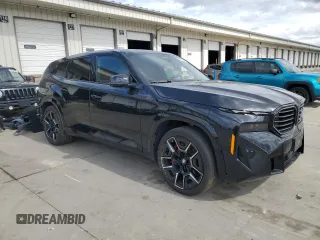 2023 BMW XM z VIN 5YM23CS06P9S62603, wystawiony jako Copart lot #50379015 z przebiegiem 12 532 mil mil oraz Szkoda całkowita • Salvage title. Historia ofert i sprzedaży dostępna na DreamBid. Obrazek 4.