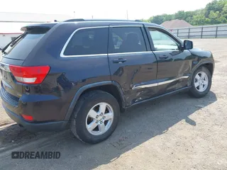 2011 Jeep Grand Cherokee Laredo with VIN 1J4RR4GG2BC550934, listed as a IAAI auction lot 42467947 with 198,904 mi miles and . Bid and sale history available at DreamBid. Image 4.