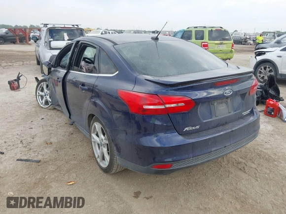 2016 Ford Focus Titanium with VIN 1FADP3J21GL404602, listed as a IAAI auction lot 42270177 with 118,369 mi miles and . Bid and sale history available at DreamBid. Image 3.