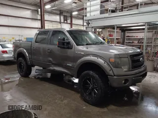2014 Ford F-150 XL with VIN 1FTFW1ET8EFC55842, listed as a IAAI auction lot 42108858 with 190,601 mi miles. Bid and sale history available at carsss.com. Image 1.