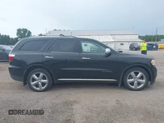 2013 Dodge Durango Citadel with VIN 1C4SDJET3DC563618, listed as a IAAI auction lot 42828144 with 202,648 mi miles and . Bid and sale history available at DreamBid. Image 13.