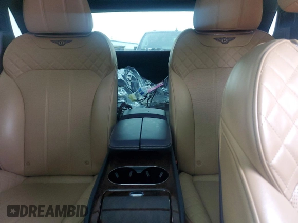 2017 Bentley Bentayga W12 z VIN SJAAC2ZV2HC014080, wystawiony jako Copart lot #44806115 z przebiegiem 63 077 mil mil oraz Szkody całkowita. Historia ofert i sprzedaży dostępna na DreamBid. Obrazek 10.