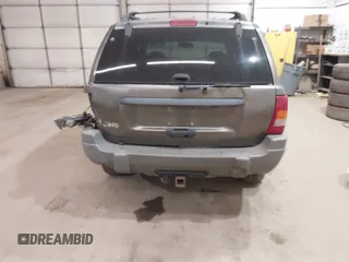 2000 Jeep Grand Cherokee Laredo z VIN 1J4GW48S1YC277710, wystawiony jako IAAI lot #42033564 z przebiegiem Nie podano mil oraz . Historia ofert i sprzedaży dostępna na DreamBid. Obrazek 16.