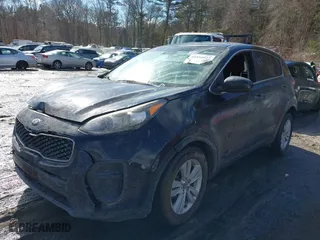 2018 Kia Sportage LX with VIN KNDPM3AC5J7380328, listed as a IAAI auction lot 41554927 with 197,778 mi miles. Bid and sale history available at carsss.com. Image 18.