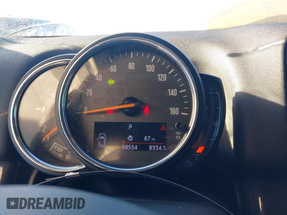 2018 MINI Countryman Cooper S with VIN WMZYT5C3XJ3E61612, listed as a IAAI auction lot 41276107 with 59,554 mi miles and . Bid and sale history available at DreamBid. Image 7.