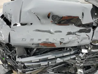 2025 Land Rover Defender with VIN SALEWFFE9S2369515, listed as a Copart auction lot 43980615 with 6,363 mi miles and Salvage title. Bid and sale history available at DreamBid. Image 12.