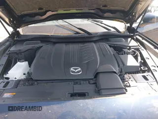 2024 Mazda CX-90 Premium Plus with VIN JM3KKEHD8R1186750, listed as a IAAI auction lot 41795353 with 5,144 mi miles and . Bid and sale history available at DreamBid. Image 10.