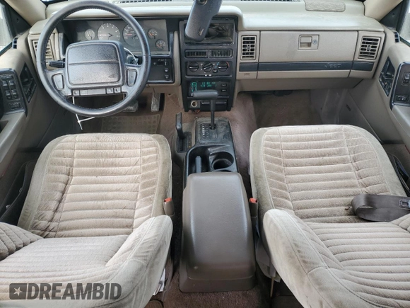 1994 Jeep Grand Cherokee Laredo с VIN 1J4GZ58S7RC356071, выставлен на аукционе Copart как лот 50851845 с пробегом 209 517 миль миль и Чистый • Clean title. История ставок и продаж доступна на DreamBid. Изображение 8.