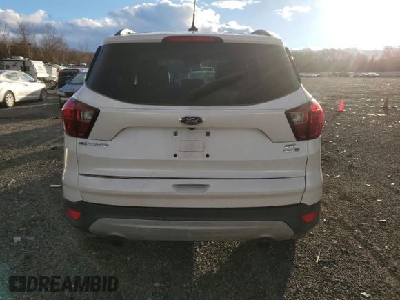 2019 Ford Escape SEL with VIN 1FMCU9HD8KUA83956, listed as a Copart auction lot 87009664 with 70,925 mi miles and Salvage Title. Bid and sale history available at carsss.com. Image 6.