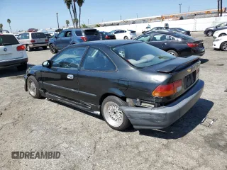 1997 Honda Civic DX with VIN 1HGEJ6128VL083271, listed as a Copart auction lot 72088024 with 329,655 mi miles and Salvage Title. Bid and sale history available at carsss.com. Image 2.