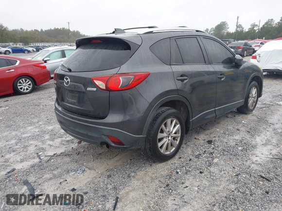2015 Mazda CX-5 Touring with VIN JM3KE2CY4F0435563, listed as a IAAI auction lot 41311988 with 187,183 mi miles. Bid and sale history available at carsss.com. Image 4.