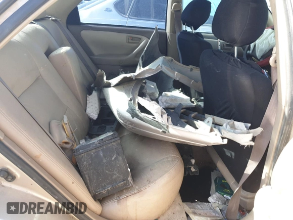 1999 Toyota Camry LE z VIN JT2BF28K5X0200853, wystawiony jako Copart lot #50666075 z przebiegiem Nie podano mil oraz Nie do naprawy • Non repairable. Historia ofert i sprzedaży dostępna na DreamBid. Obrazek 10.