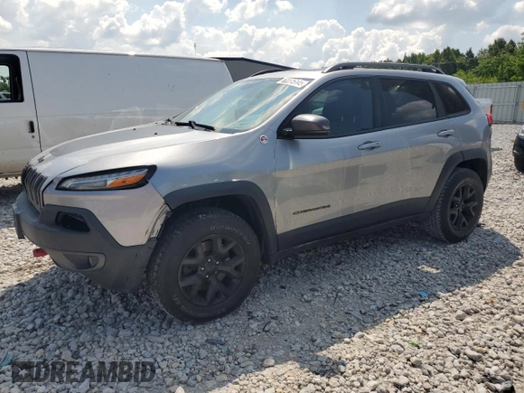 2016 Jeep Cherokee Trailhawk with VIN 1C4PJMBS4GW353088, listed as a Copart auction lot 62275145 with 129,758 mi miles and Clean title. Bid and sale history available at DreamBid. Image 1.