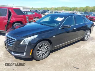 2017 Cadillac CT6 Luxury AWD z VIN 1G6KD5RS5HU133097, wystawiony jako IAAI lot #42144553 z przebiegiem 167 460 mil mil oraz . Historia ofert i sprzedaży dostępna na DreamBid. Obrazek 18.