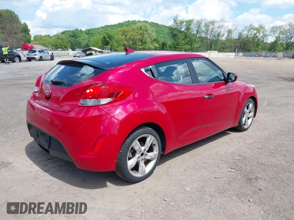 2012 Hyundai Veloster w/Gray Int z VIN KMHTC6AD7CU036446, wystawiony jako IAAI lot #42267057 z przebiegiem 110 564 mil mil oraz . Historia ofert i sprzedaży dostępna na DreamBid. Obrazek 4.