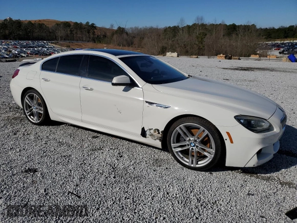 2013 BMW 6 Series 650i xDrive with VIN WBA6B4C53DD098522, listed as a Copart auction lot 86896564 with 121,198 mi miles and Salvage Title. Bid and sale history available at carsss.com. Image 4.