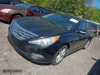 2013 Hyundai Sonata SE with VIN 5NPEC4AC8DH552397, listed as a IAAI auction lot 42055737 with 164,384 mi miles. Bid and sale history available at carsss.com. Image 2.