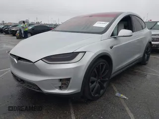 2016 Tesla Model X P90D with VIN 5YJXCBE41GF006284, listed as a IAAI auction lot 41809683 with 71,135 mi miles. Bid and sale history available at carsss.com. Image 2.