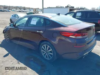 2019 Kia Optima EX with VIN 5XXGU4L12KG292041, listed as a IAAI auction lot 42065738 with 74,222 mi miles and . Bid and sale history available at carsss.com. Image 3.