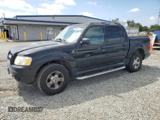 2004 Ford Explorer Sport Trac XLS z VIN 1FMDU77KX4UB81284, wystawiony jako Copart lot #54976525 z przebiegiem 179 205 mil mil oraz Tytuł czysty. Historia ofert i sprzedaży dostępna na DreamBid. Obrazek 1.