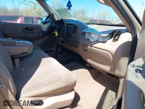 1999 Ford F-150 XL с VIN 1FTRX18L4XKB33057, выставлен на аукционе IAAI как лот 42227009 с пробегом Не указан миль и . История ставок и продаж доступна на DreamBid. Изображение 5.