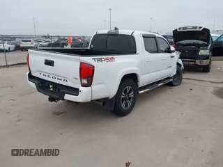 2019 Toyota Tacoma SR z VIN 3TMCZ5AN4KM220154, wystawiony jako IAAI lot #41602065 z przebiegiem 92 345 mil mil oraz . Historia ofert i sprzedaży dostępna na DreamBid. Obrazek 4.