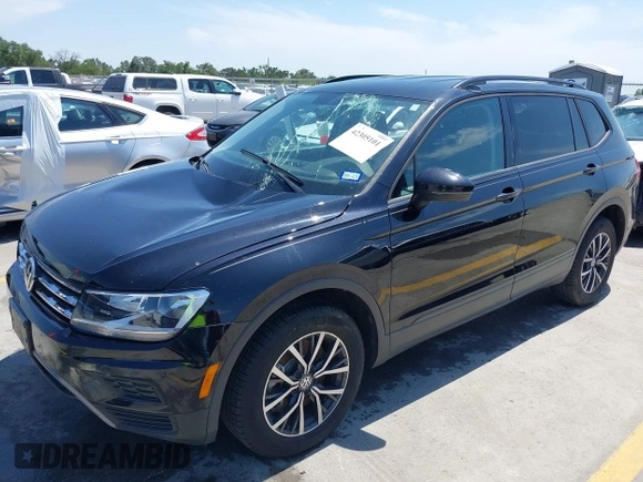 2021 Volkswagen Tiguan S with VIN 3VV1B7AX9MM067347, listed as a IAAI auction lot 42305101 with 77,042 mi miles and . Bid and sale history available at DreamBid. Image 18.