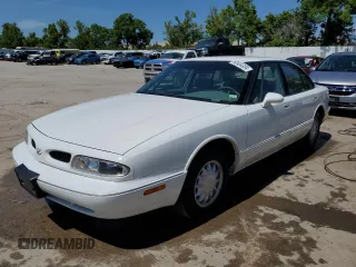 1998 Oldsmobile 88 LS z VIN 1G3HN52K9W4828694, wystawiony jako Copart lot #60404334 z przebiegiem 109 587 mil mil oraz Szkody całkowita. Historia ofert i sprzedaży dostępna na DreamBid. Obrazek 1.
