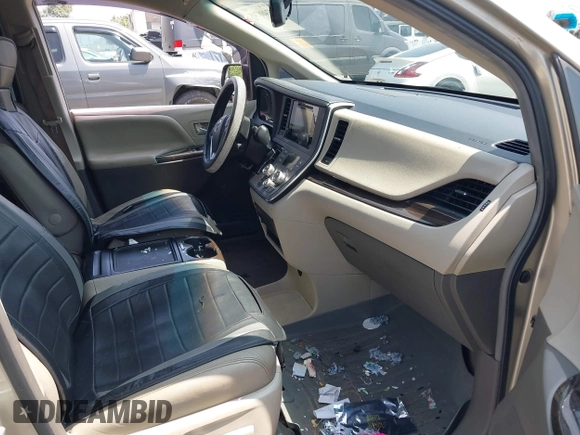 2015 Toyota Sienna XLE with VIN 5TDYK3DC4FS560743, listed as a IAAI auction lot 42488745 with 145,009 mi miles and . Bid and sale history available at DreamBid. Image 5.