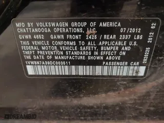 2013 Volkswagen Passat TDI SE with VIN 1VWBN7A39DC003511, listed as a IAAI auction lot 41469644 with 167,962 mi miles. Bid and sale history available at carsss.com. Image 9.